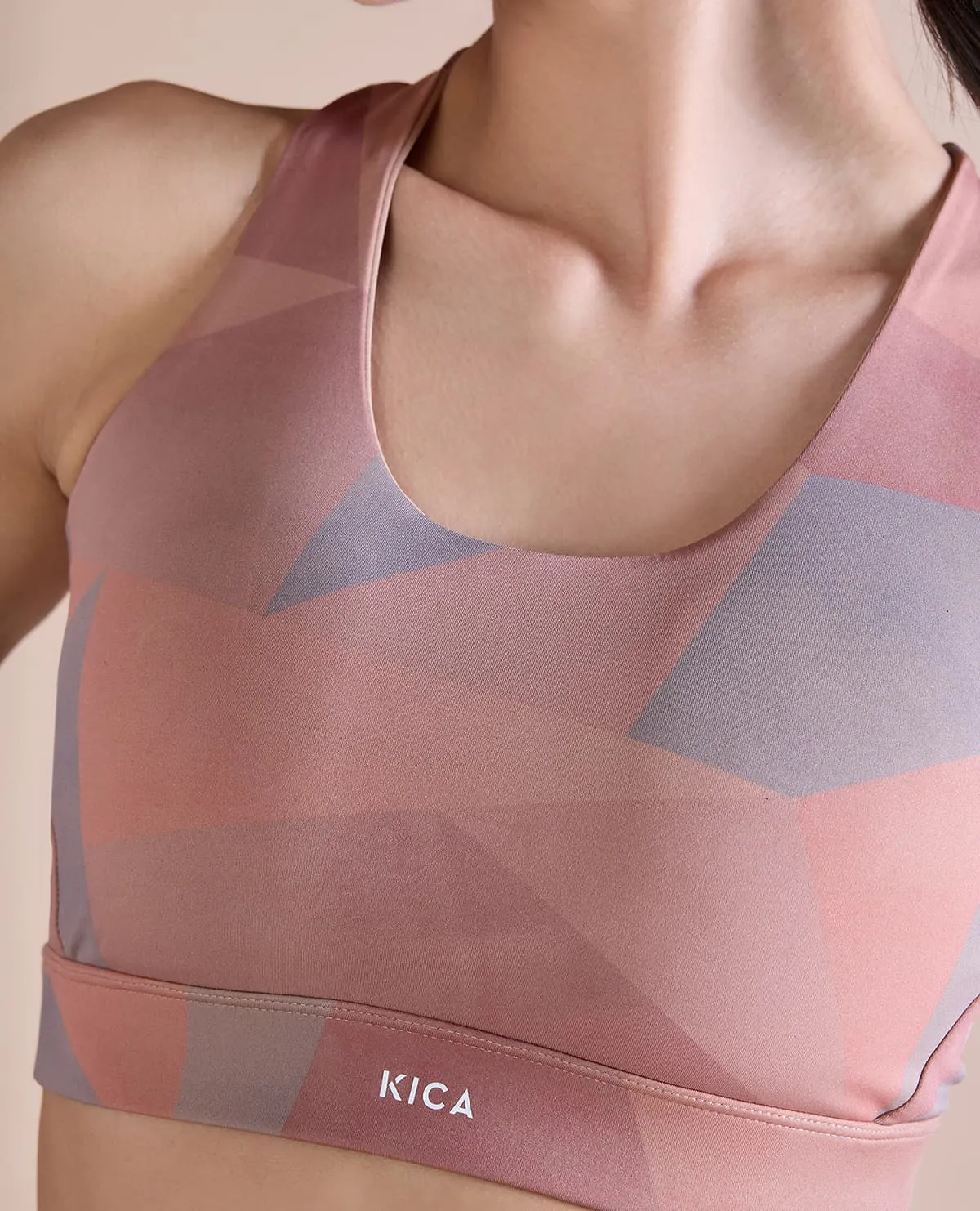 Compression fabric Fashionable Strappy Sports Bra with Removable Pads