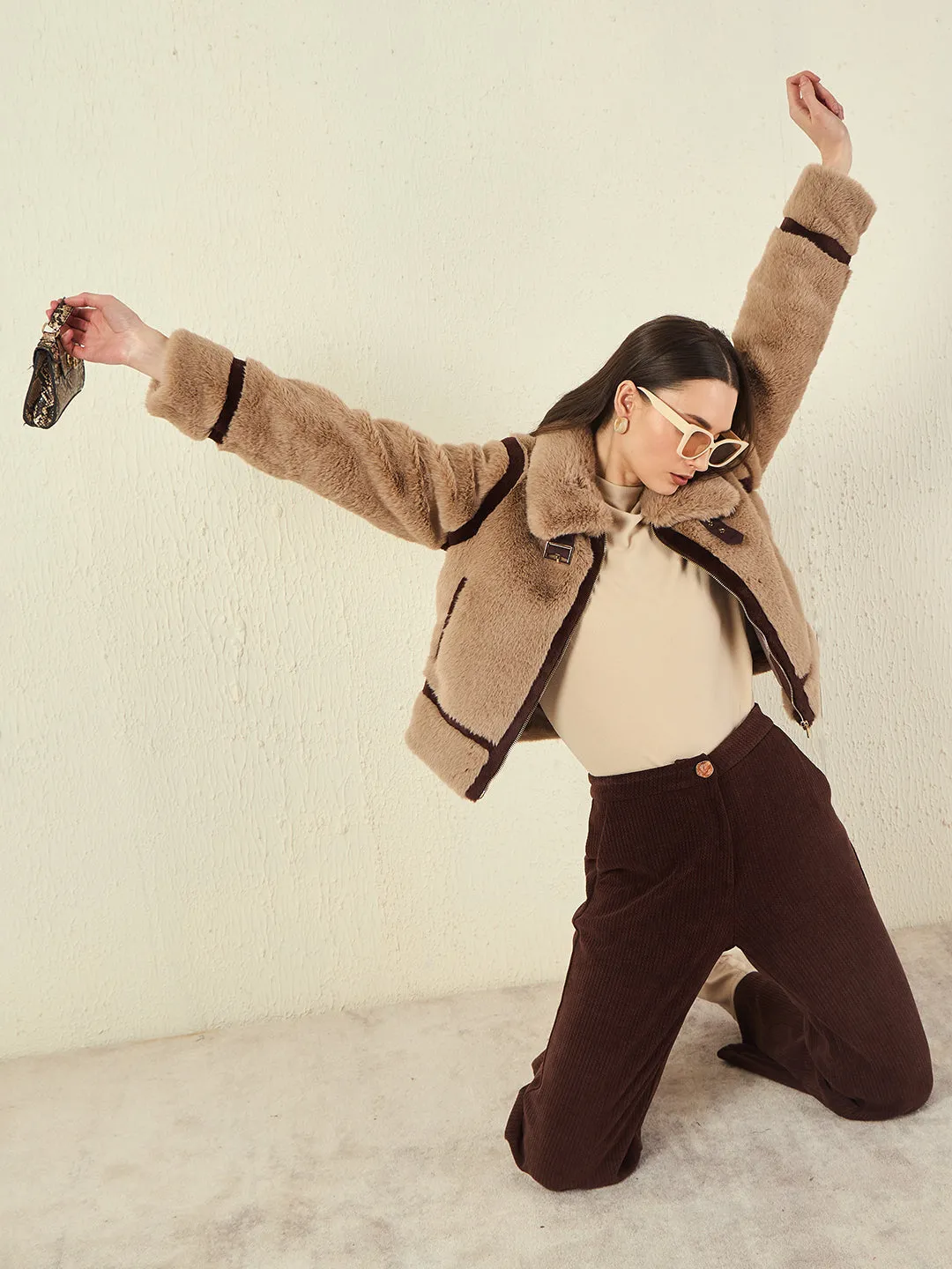 Madame Funnel Neck Full Sleeve Seam Detailed Solid Beige Knitted Top StretchableFabric WaterRepellent Surface