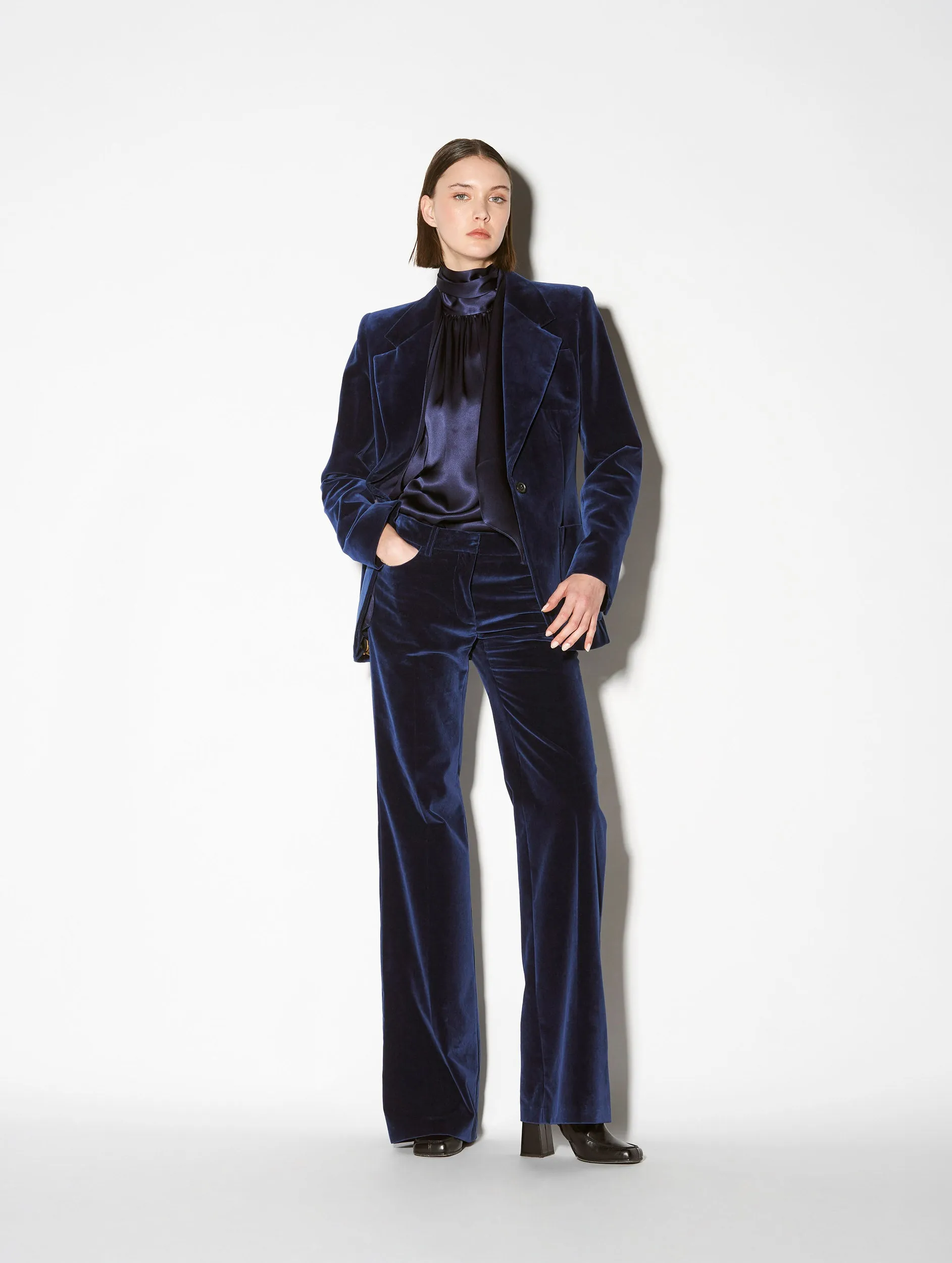 Flared blue velvet trousers Loose cut Functional Fit