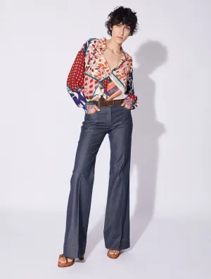 Blue washed denim flared trousers BreathableMaterial Distressed finish