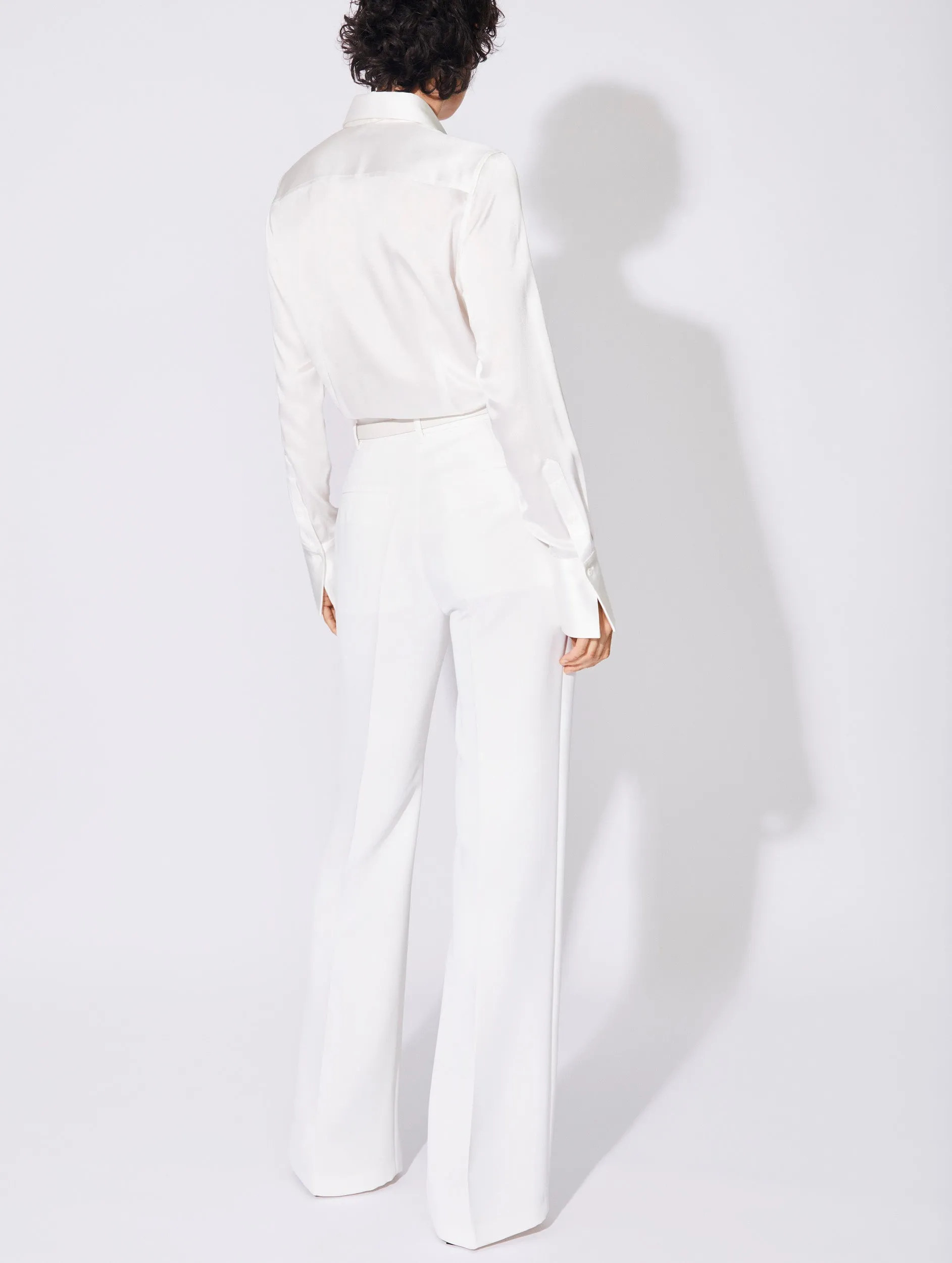 Non Irritating White crepe high waisted flared trousers
