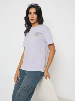 Sleek And Stylish Madame Graphic Print Adorned Lilac Cotton T-shirt
