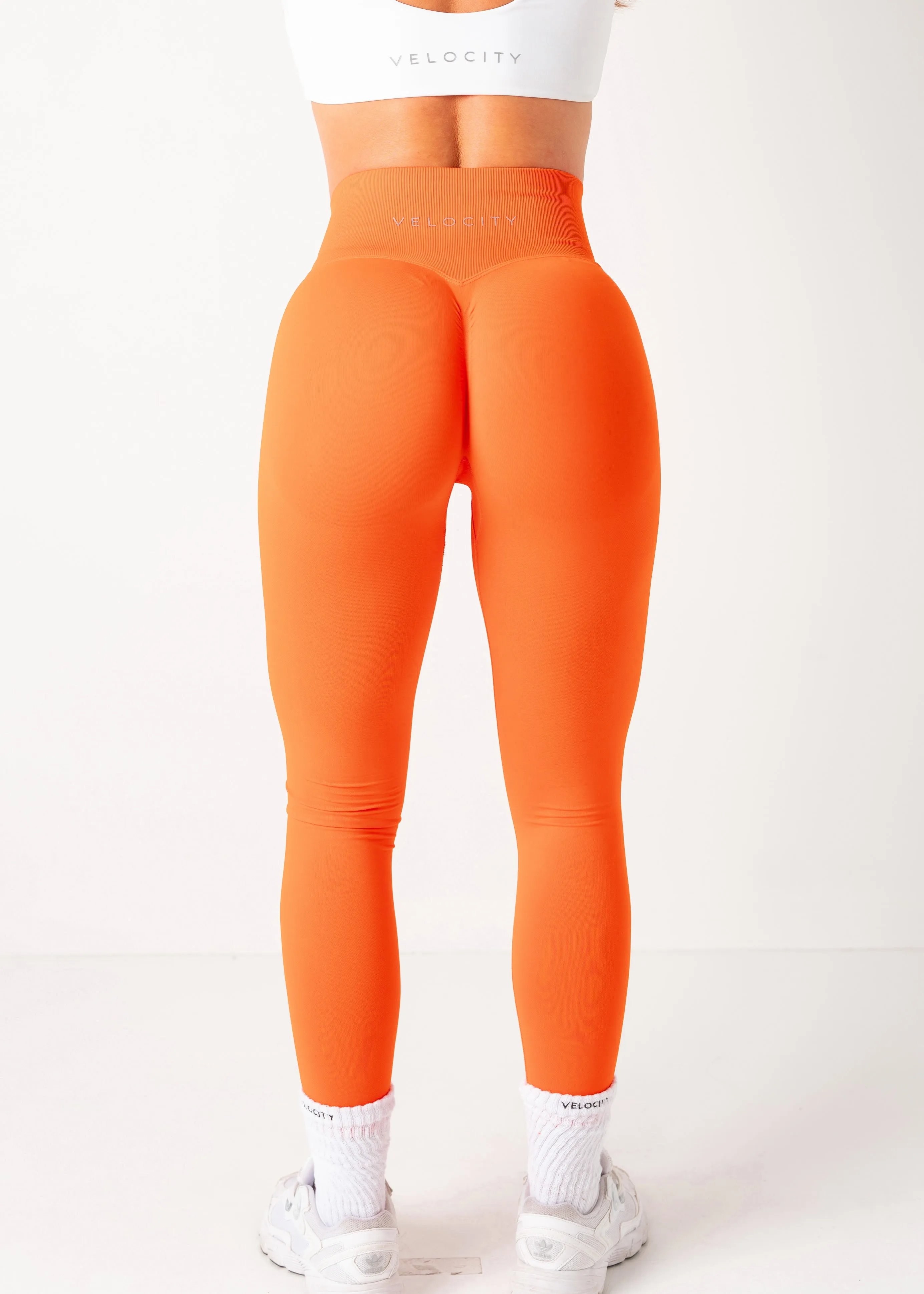 Slim Silhouette Versatile Design ULTIMATE SEAMLESS SCRUNCH LEGGINGS MINI - PAPAYA
