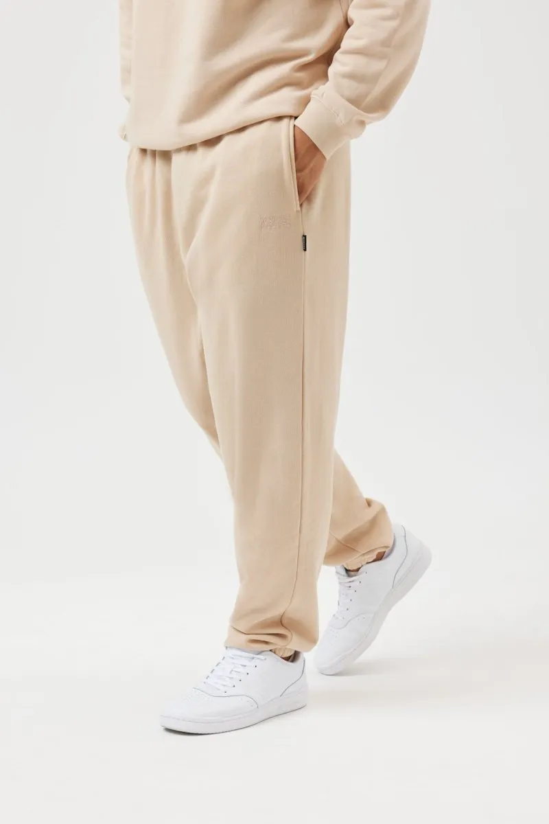 Abrasion Resistant Surface SecureZipperClosures Insport Unisex Alaska Bone Elastic Leg Trackpants