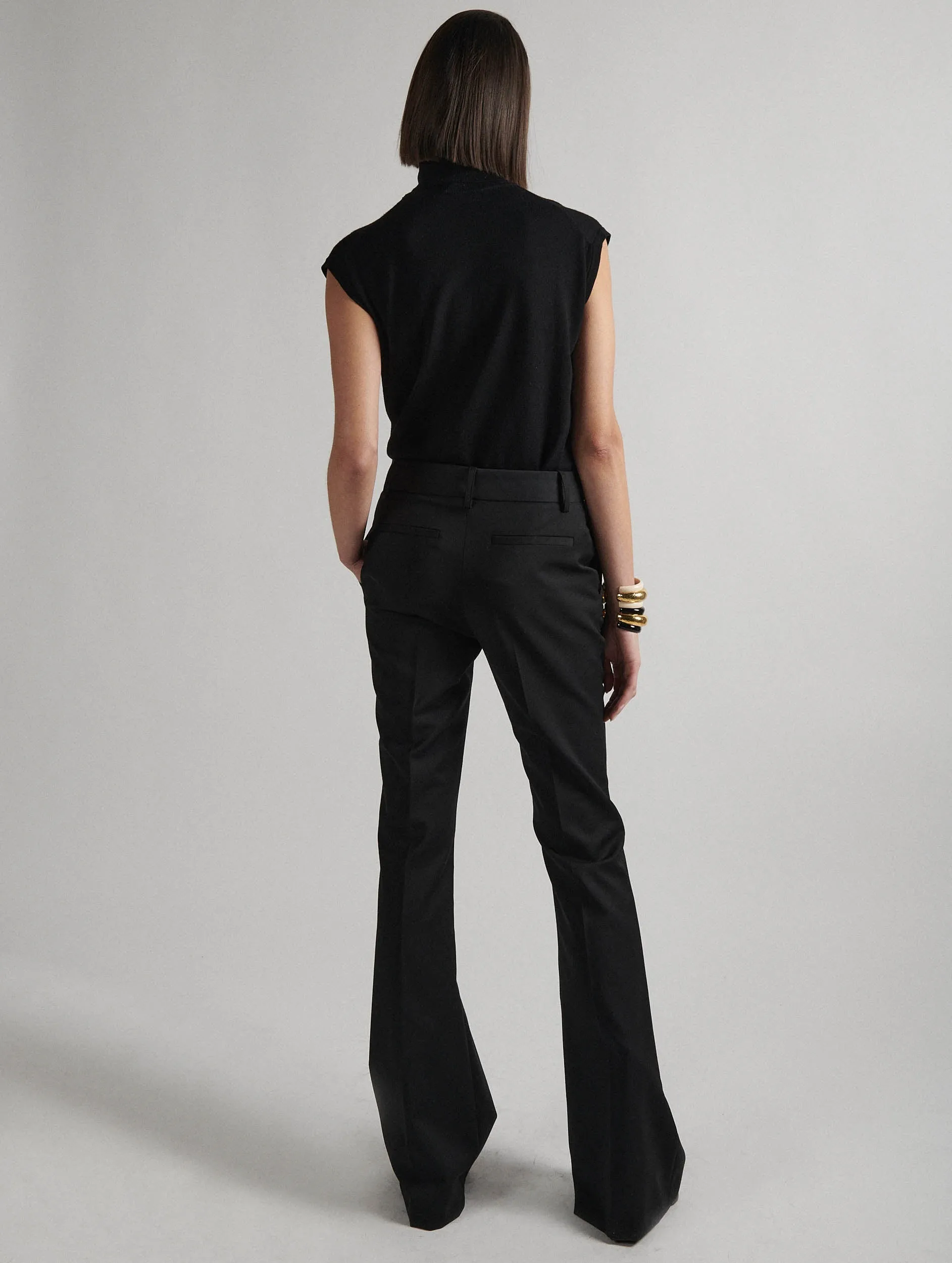 Built-in shorts Black stretch wool gabardine bootleg-cut trousers